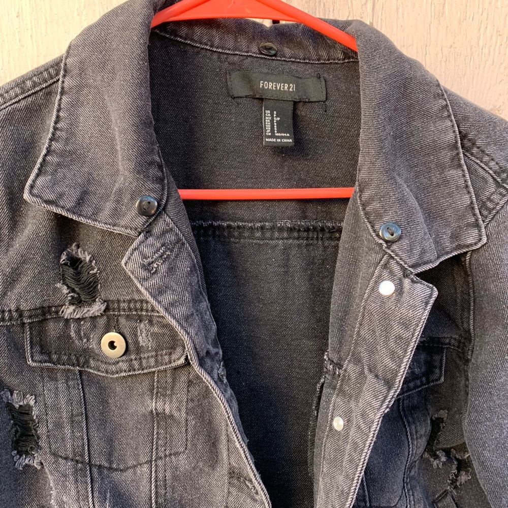 Black ripped denim jacket